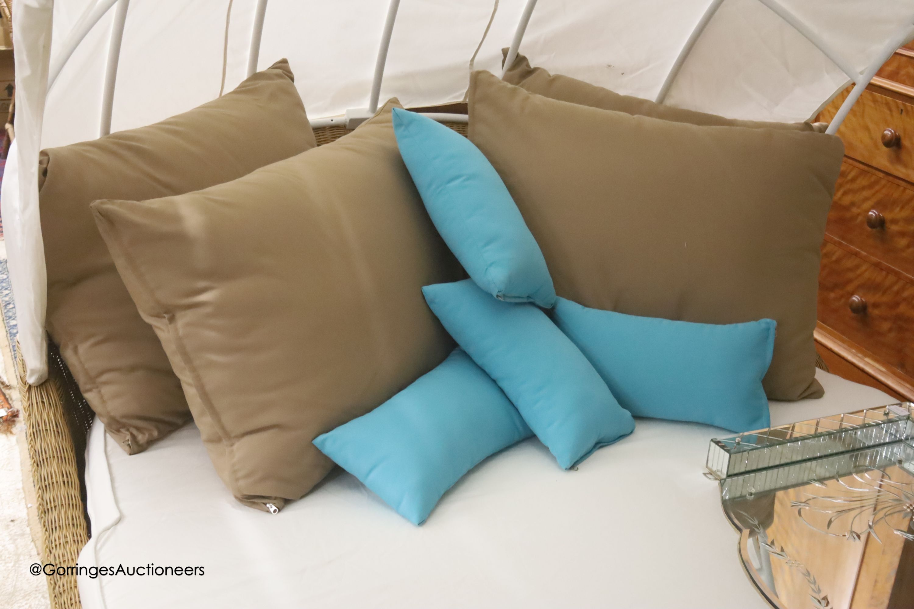 A Bevan Funnel All Weather rattan double garden daybed with metal canopy, mattress and cushions, approx. length 210cm, depth 160cm, height 166cm